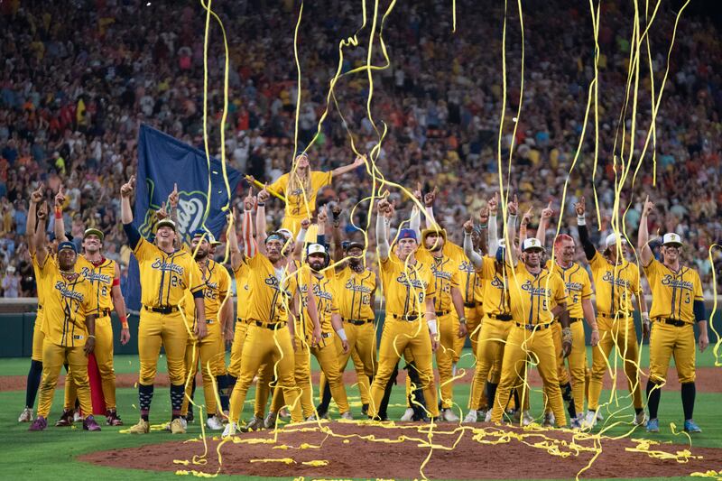 CLEMSON, SOUTH CAROLINA - APRIL 26: Savannah Bananas celebrate after a game against the Party Animals at Memorial Stadium on April 26, 2025 in Clemson, South Carolina. A record-breaking crowd of 80,000 reportedly attended the game, the first of ten Savannah Bananas baseball games to be broadcast this summer by ESPN, and the first of three Banana Ball games to be played in football stadiums. (Photo by Sean Rayford/Getty Images)