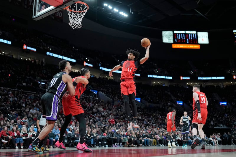 PORTLAND, OREGON - FEBRUARY 06: Shaedon Sharpe #17 of the Portland Trail Blazers grabs a rebound during the first half against the Sacramento Kings at Moda Center on February 06, 2025 in Portland, Oregon. NOTE TO USER: User expressly acknowledges and agrees that, by downloading and or using this photograph, User is consenting to the terms and conditions of the Getty Images License Agreement. (Photo by Soobum Im/Getty Images)